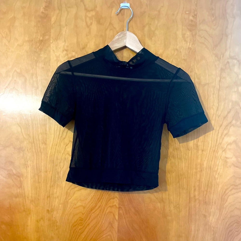 Sheer black tshirt, mesh. Excellent for layering over bra tops. XS - $12